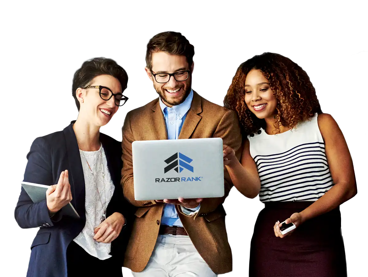 Razor rank representatives standing together looking at a laptop smiling